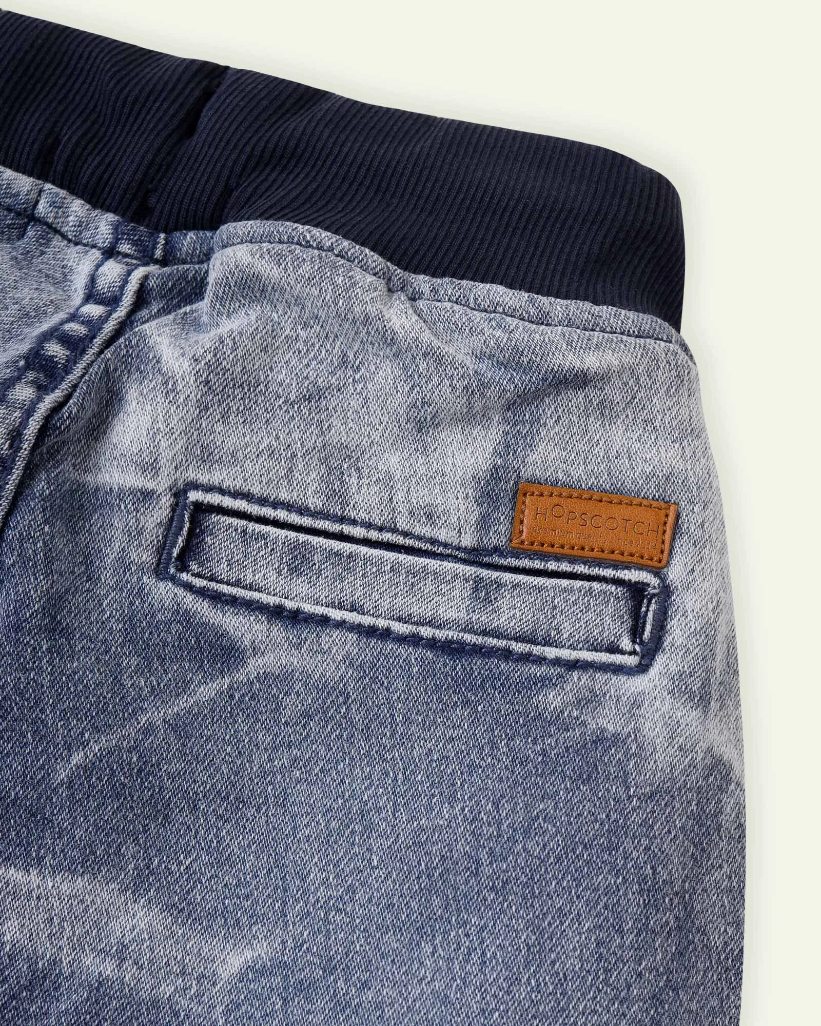 Random Wash Pull Up Jeans